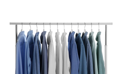 Photo of Men clothes hanging on wardrobe rack against white background
