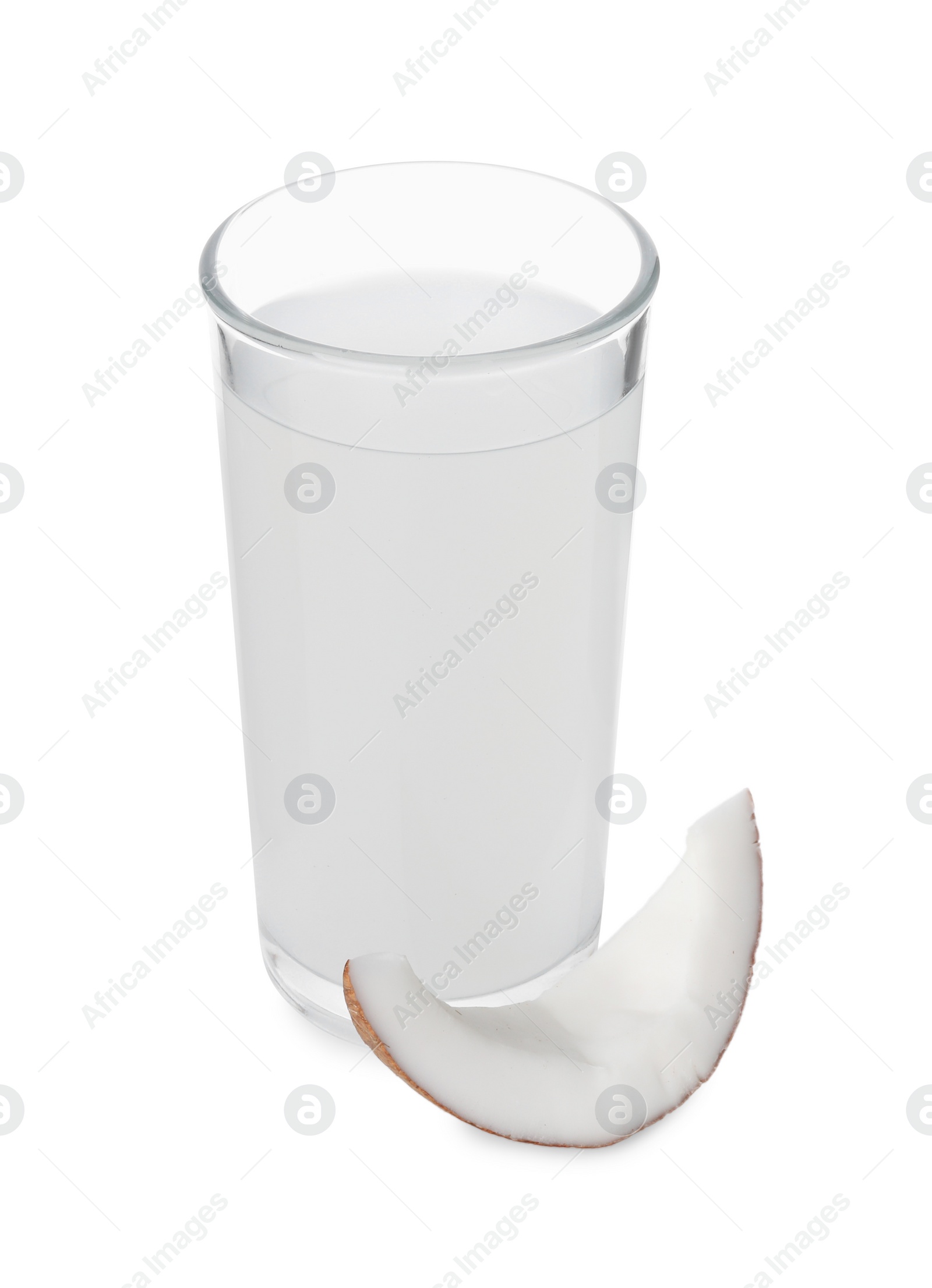 Photo of Glass of coconut water and nut isolated on white