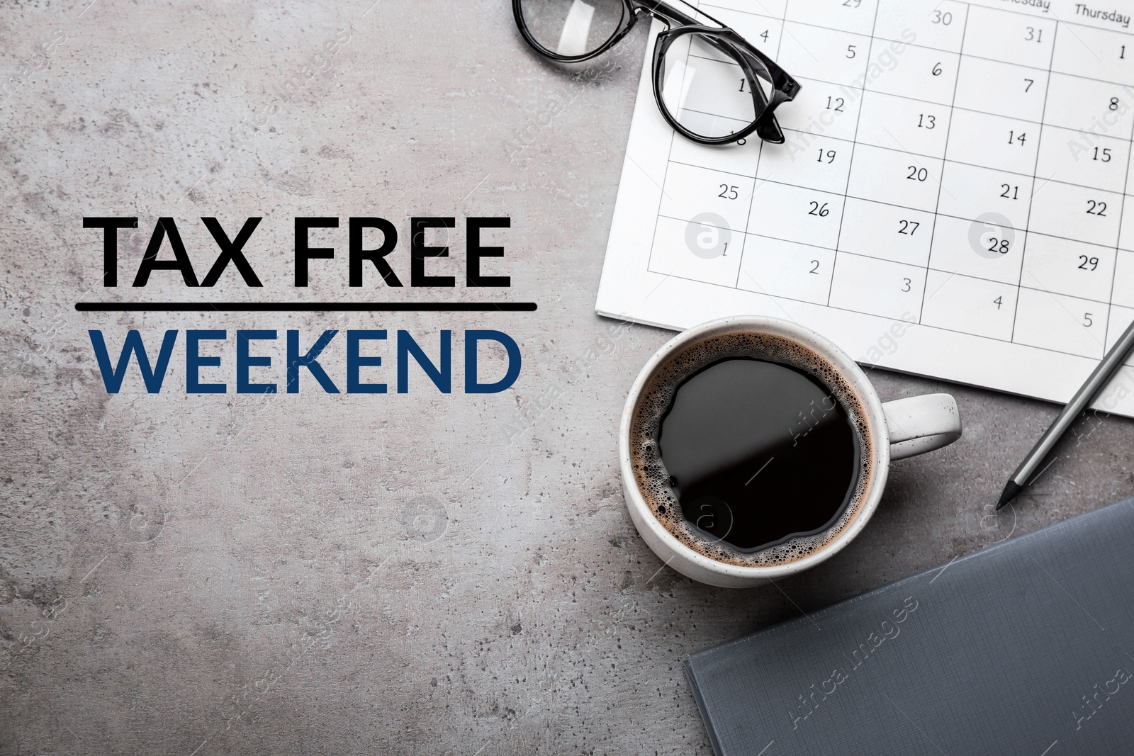 Image of Cup of coffee, stationery and text TAX FREE WEEKEND on grey table, flat lay