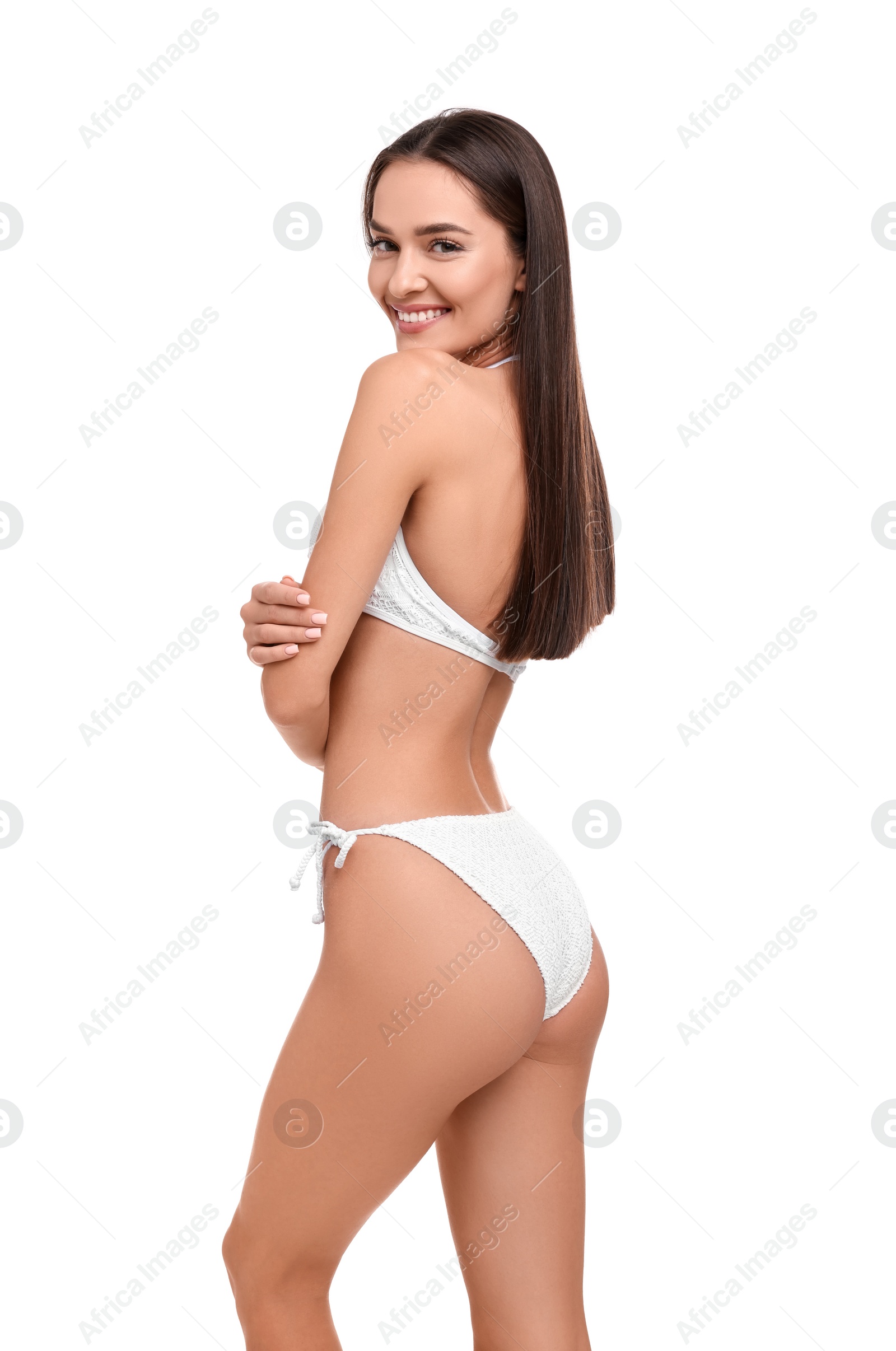 Photo of Young woman in stylish bikini isolated on white