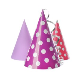 Photo of Colorful party hats on white background. Festive items