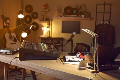 Photo of Professional audio equipment in modern radio studio