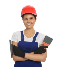Photo of Professional worker with putty knives in hard hat on white background