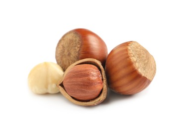 Photo of Tasty organic hazelnuts on white background. Healthy snack
