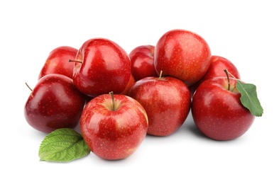 Photo of Ripe juicy red apples with leaves on white background