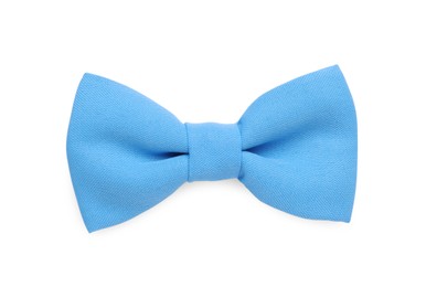 Stylish light blue bow tie on white background, top view