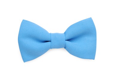 Photo of Stylish light blue bow tie on white background, top view