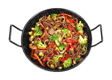 Stir-fry. Tasty noodles with meat and vegetables in wok isolated on white, top view