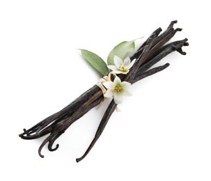 Photo of Vanilla pods, green leaves and flowers isolated on white, above view