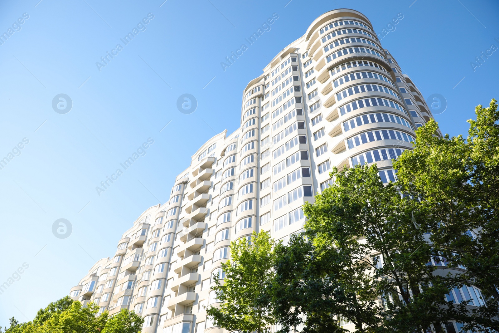 Photo of Beautiful view of modern building outdoors on sunny day