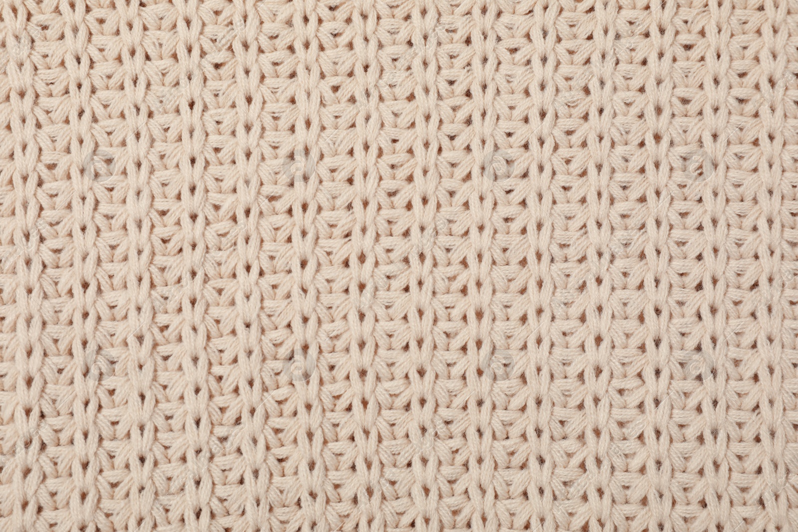Photo of Surface of winter clothing as background, closeup