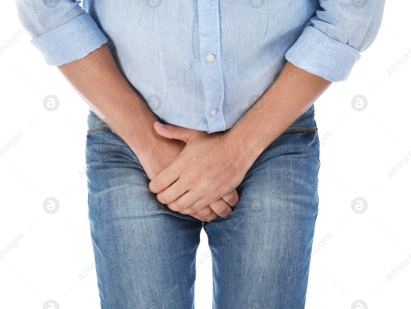 Photo of Man suffering from pain on white background, closeup. Urology problems