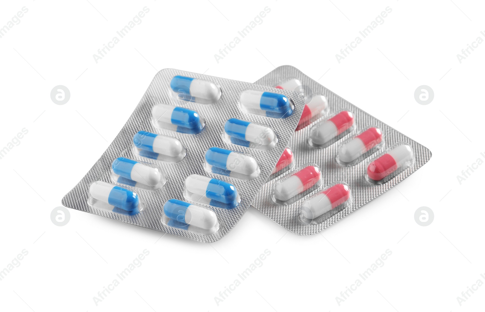 Photo of Blisters with different pills on white background