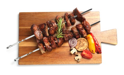 Photo of Metal skewers with delicious shish kebabs, rosemary and vegetables isolated on white, top view