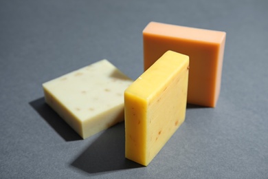 Hand made soap bars on grey background