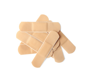 Photo of Medical sticking plasters isolated on white. First aid item