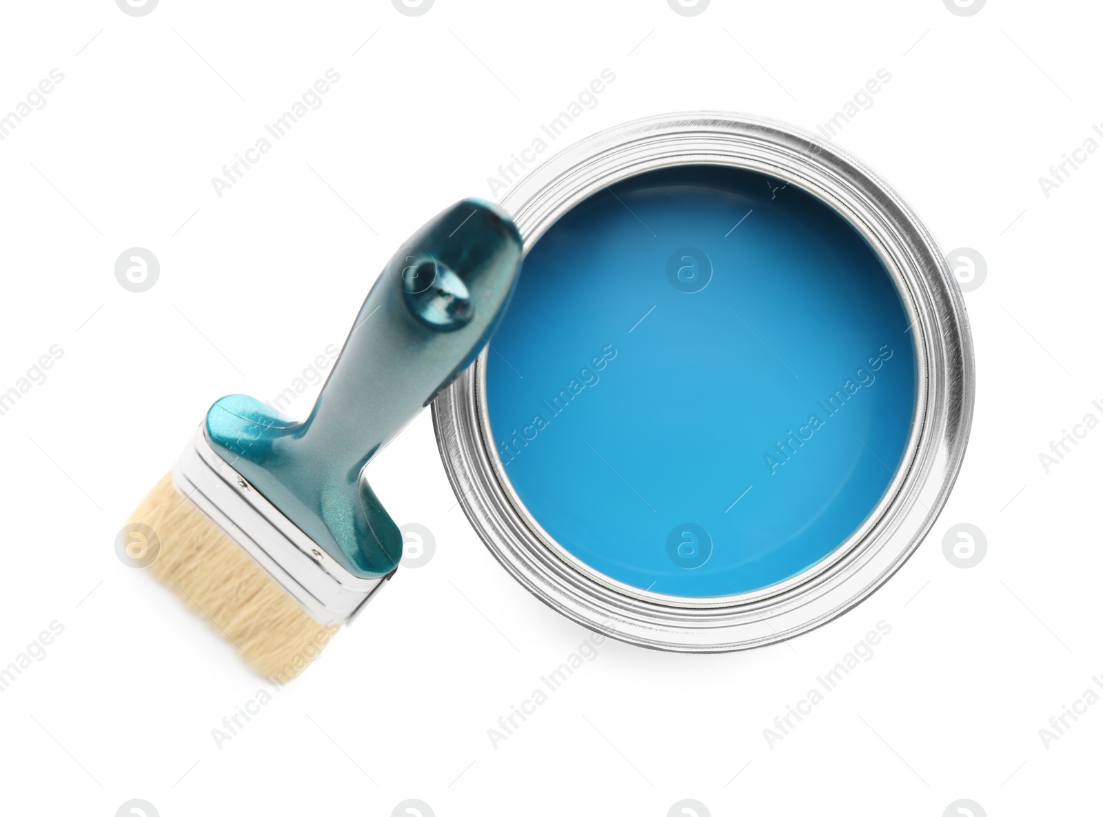 Photo of Can of blue paint and brush on white background, top view