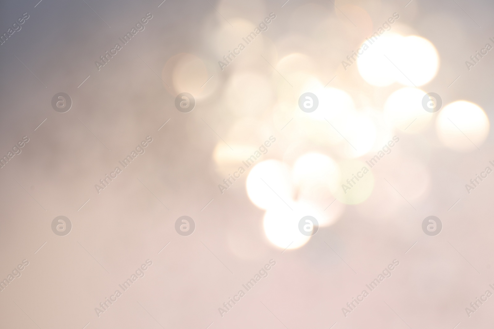 Photo of Shiny lilac background with magical bokeh effect