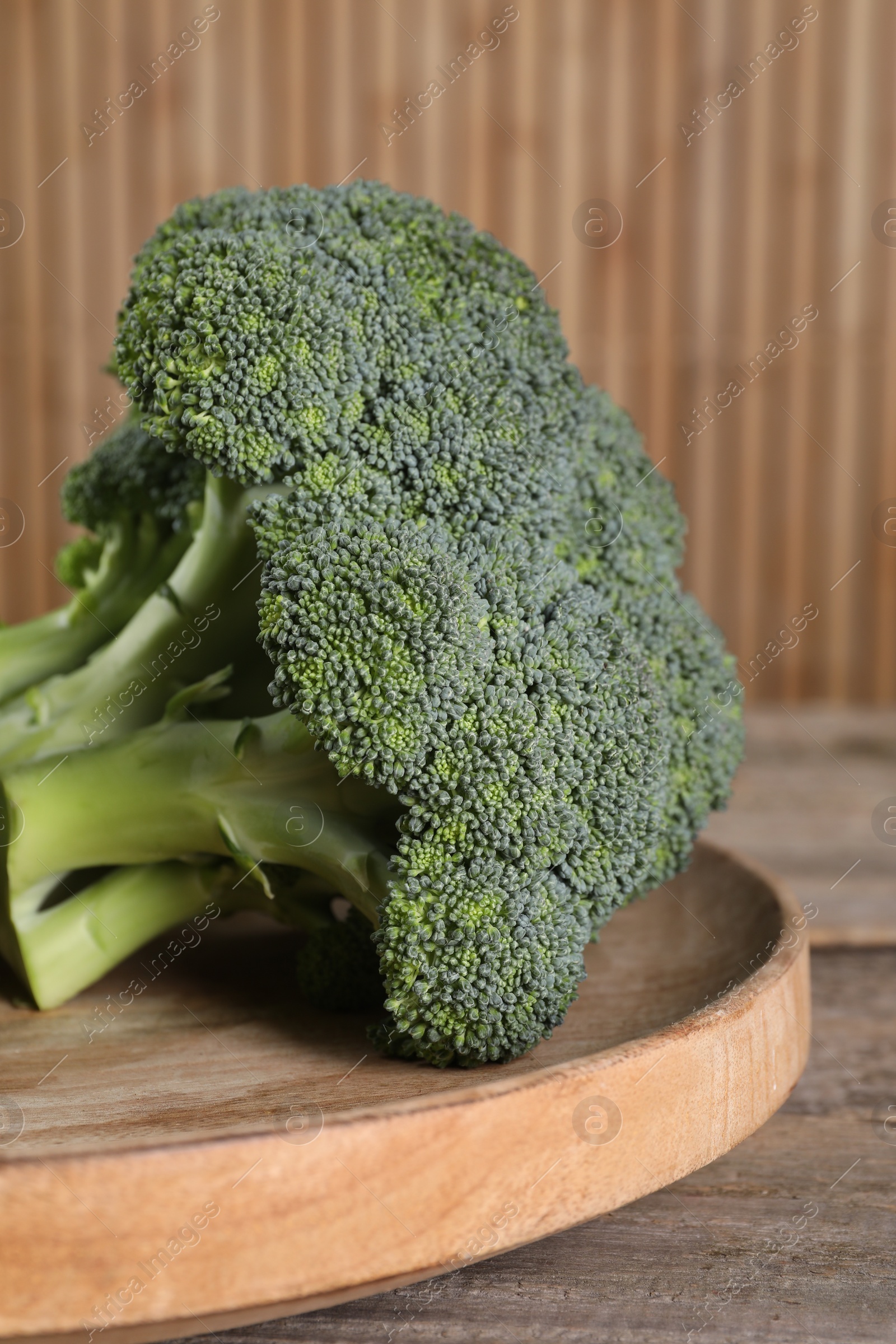 Photo of Fresh raw broccoli on table, closeup view