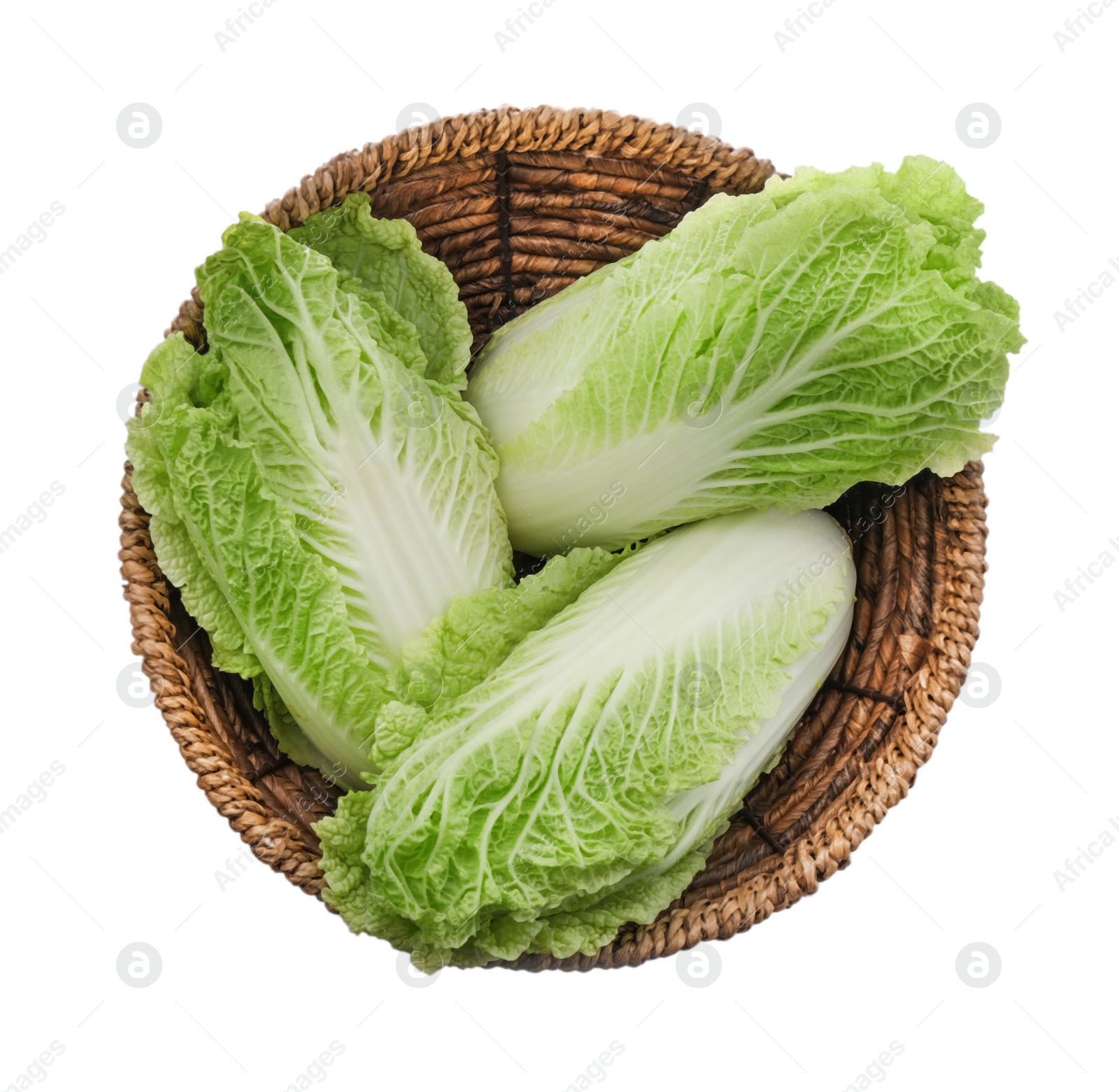 Photo of Fresh tasty Chinese cabbages in wicker basket on white background, top view