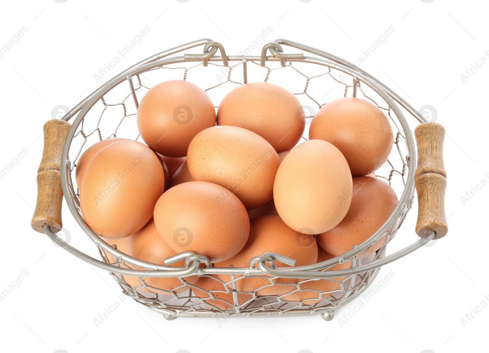 Photo of Chicken eggs in metal basket isolated on white