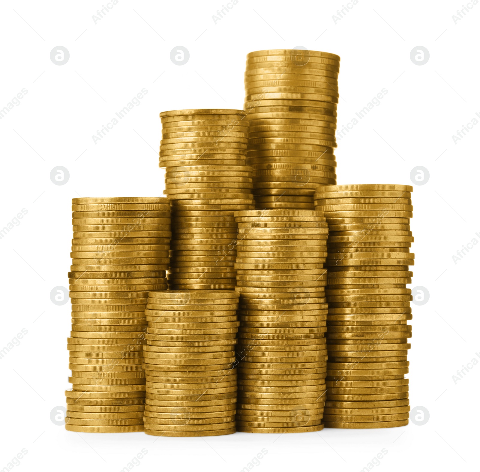 Photo of Many golden coins stacked on white background