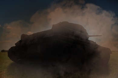 Image of Silhouette of tank on battlefield. Military machinery