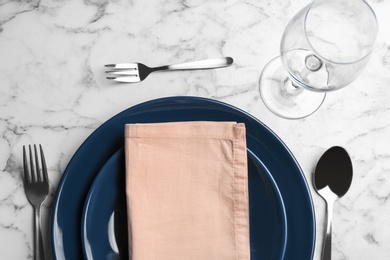 Photo of Elegant table setting on white marble background, flat lay