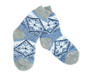 Photo of Knitted socks on white background, top view
