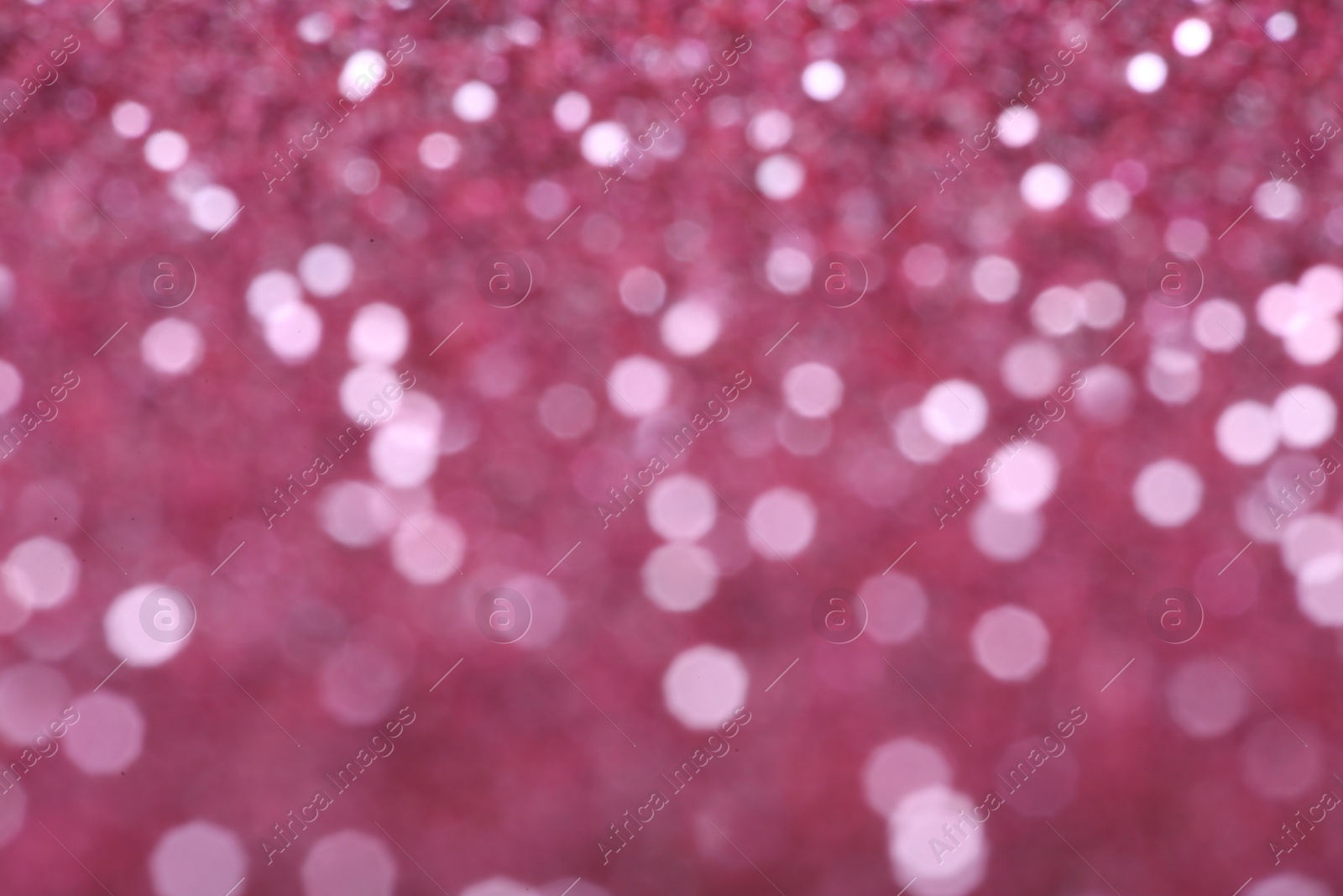 Photo of Bright magic pink bokeh effect as background