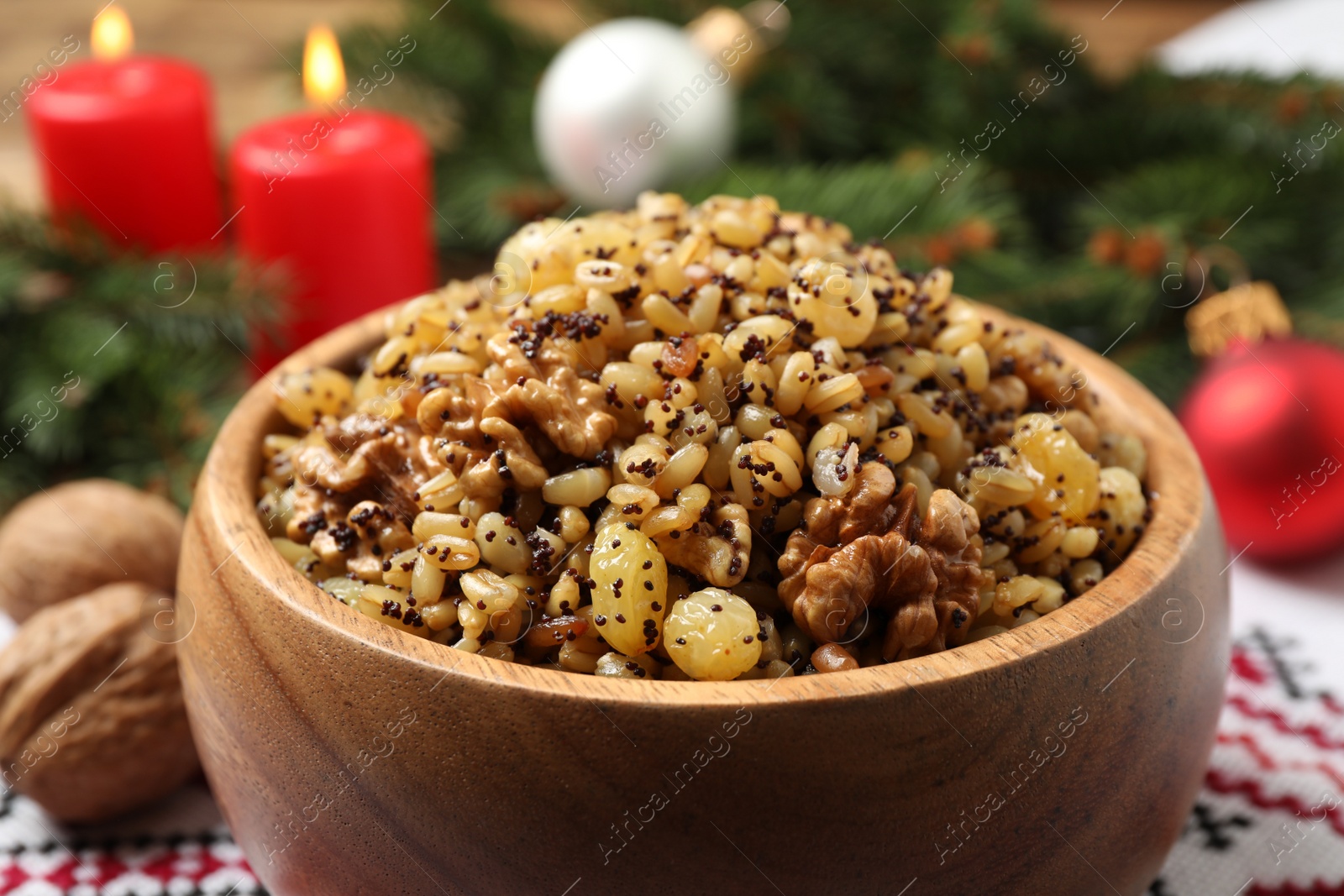 Photo of Traditional Christmas slavic dish kutia in bowl, closeup