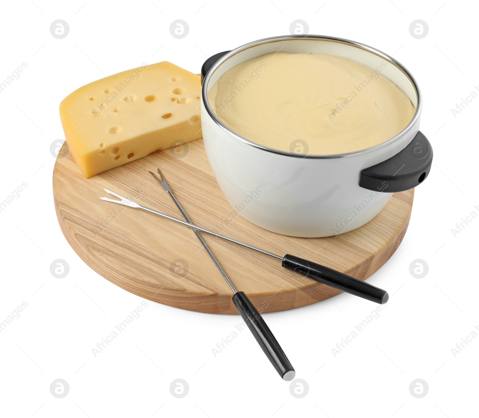 Photo of Fondue with tasty melted cheese, forks and piece isolated on white