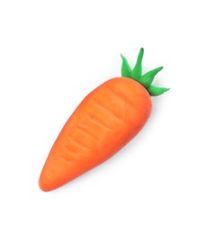 Orange carrot made from play dough on white background