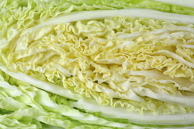 Photo of Fresh ripe Chinese cabbage as background, closeup