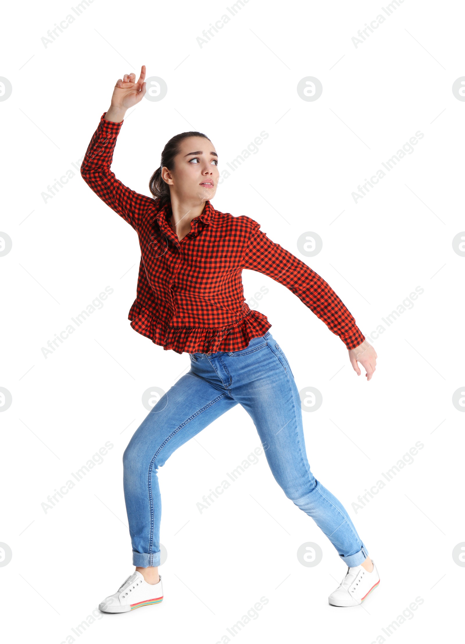 Photo of Young woman attracted to magnet on white background