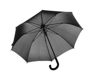 Photo of One open black umbrella isolated on white