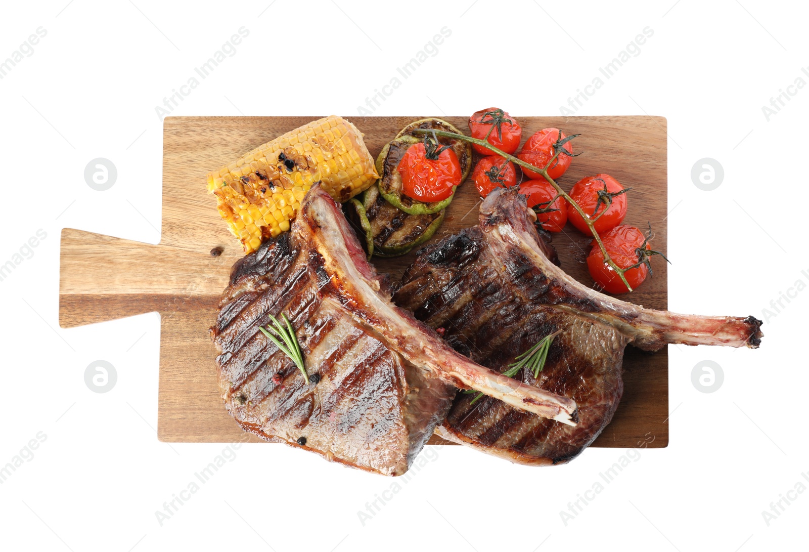 Photo of Delicious beef steaks served with vegetables isolated on white, top view
