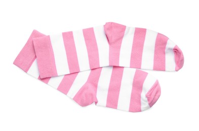 Pair of striped pink socks on white background, top view