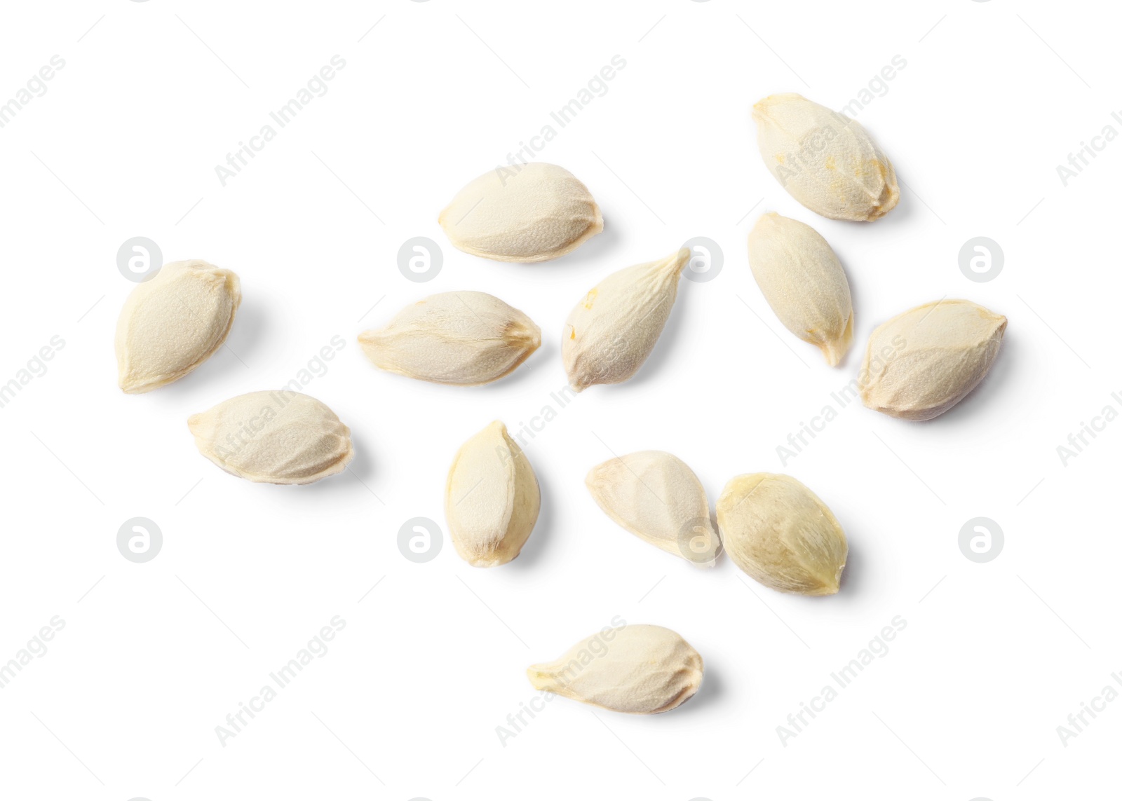 Photo of Many seeds of tangerine isolated on white, top view