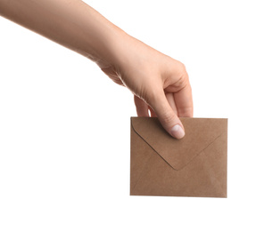 Woman holding brown paper envelope on white background, closeup