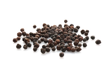 Photo of Black pepper grains on white background. Natural spice