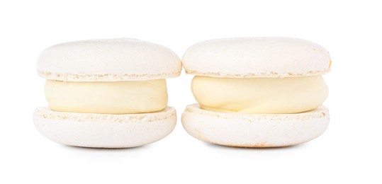 Photo of Two delicious sweet macarons isolated on white