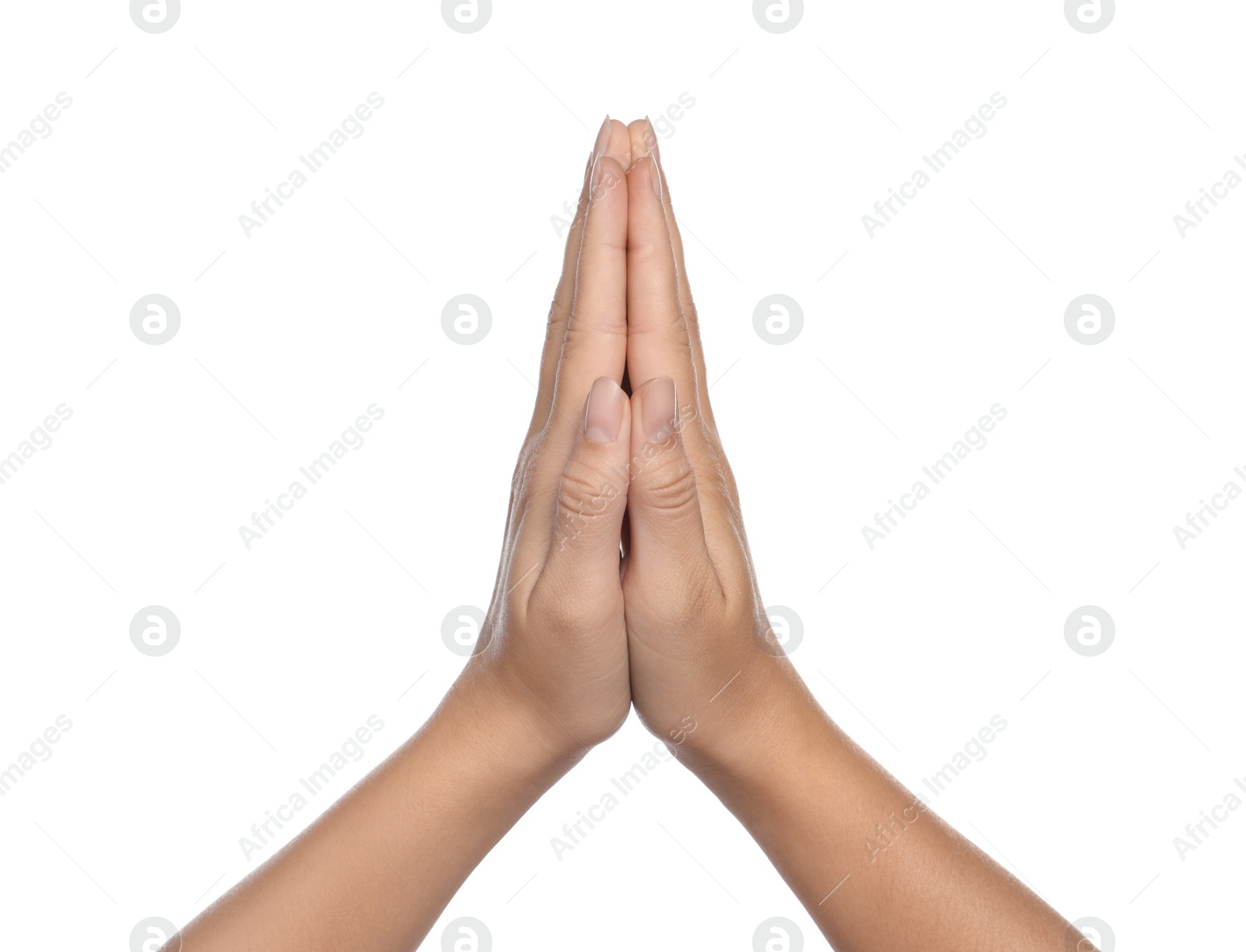 Photo of Woman holding hands clasped while praying on white background, closeup