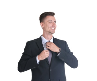 Handsome young man in suit on white background