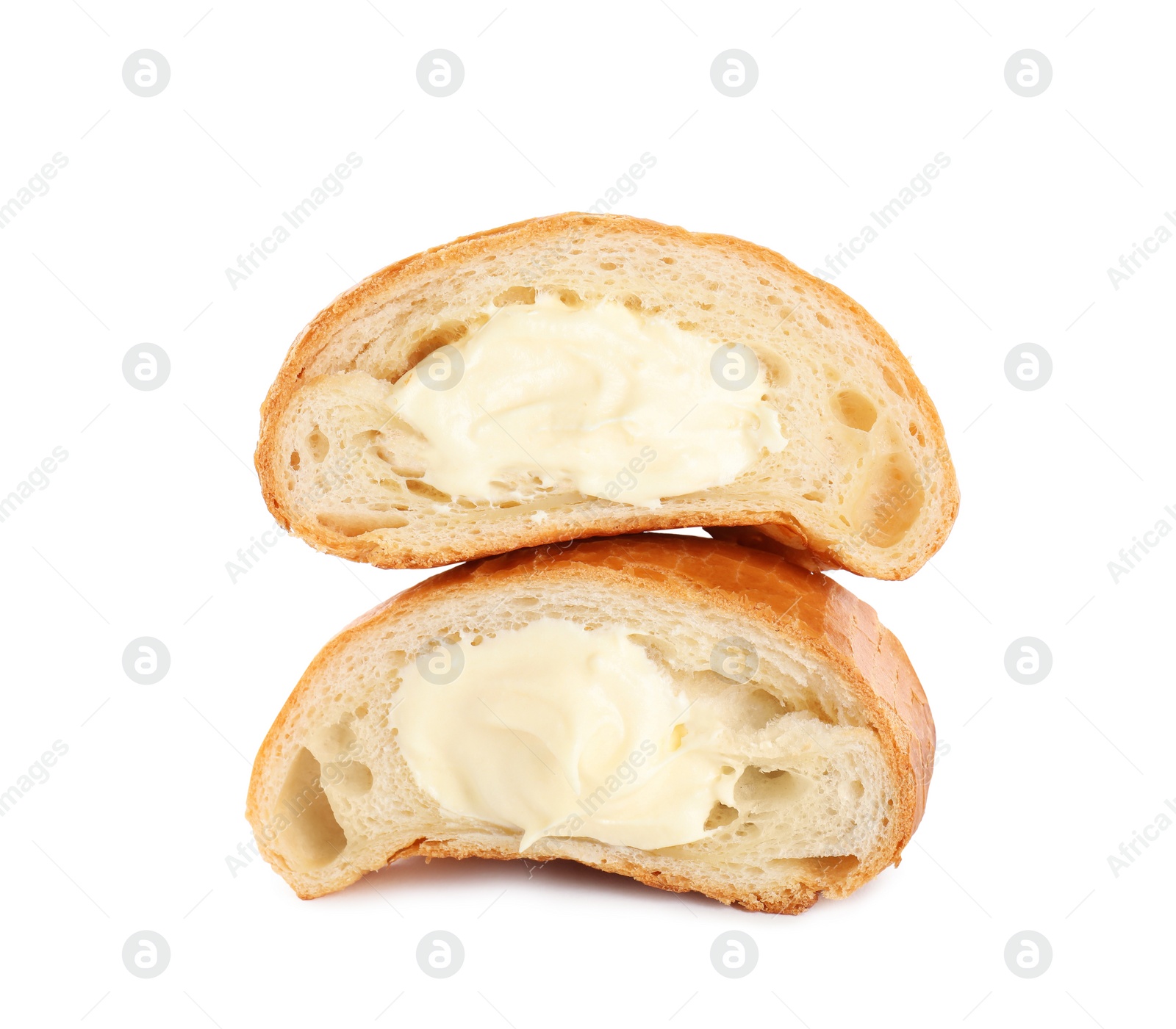 Photo of Halves of delicious croissant with cream on white background