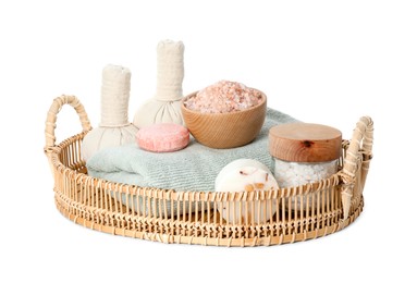 Photo of Spa composition. Towel, herbal massage bags, personal care products and sea salt on white background