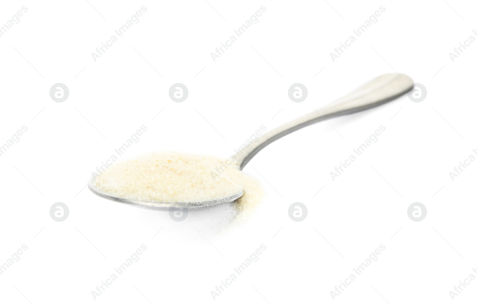 Photo of Spoon with gelatin powder isolated on white