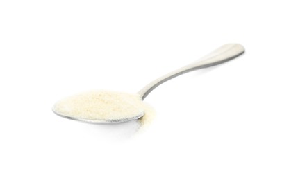 Spoon with gelatin powder isolated on white