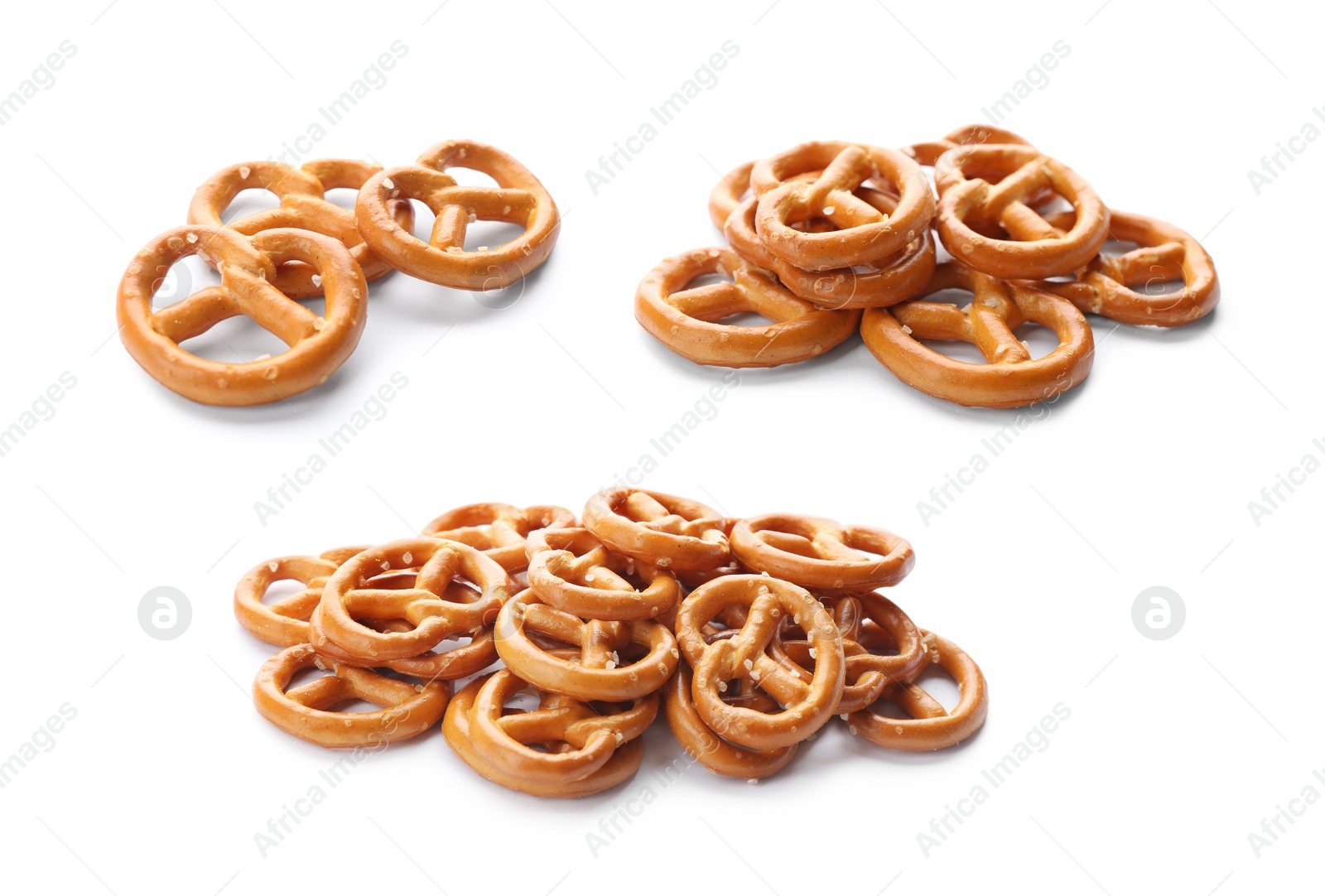 Image of Set of tasty pretzel crackers on white background