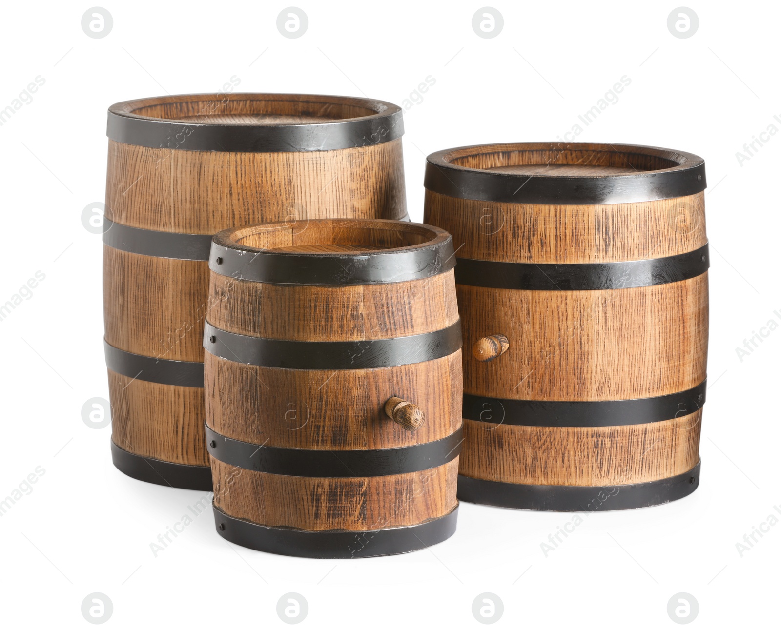 Photo of Three traditional wooden barrels on white background